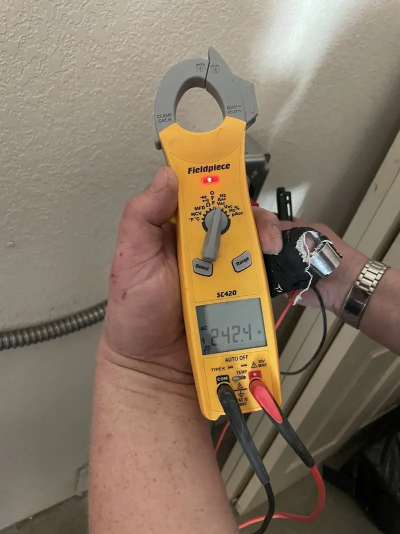 Voltage testing with clamp meter during Hot Tub / Pool Electrical Wiring in Westford